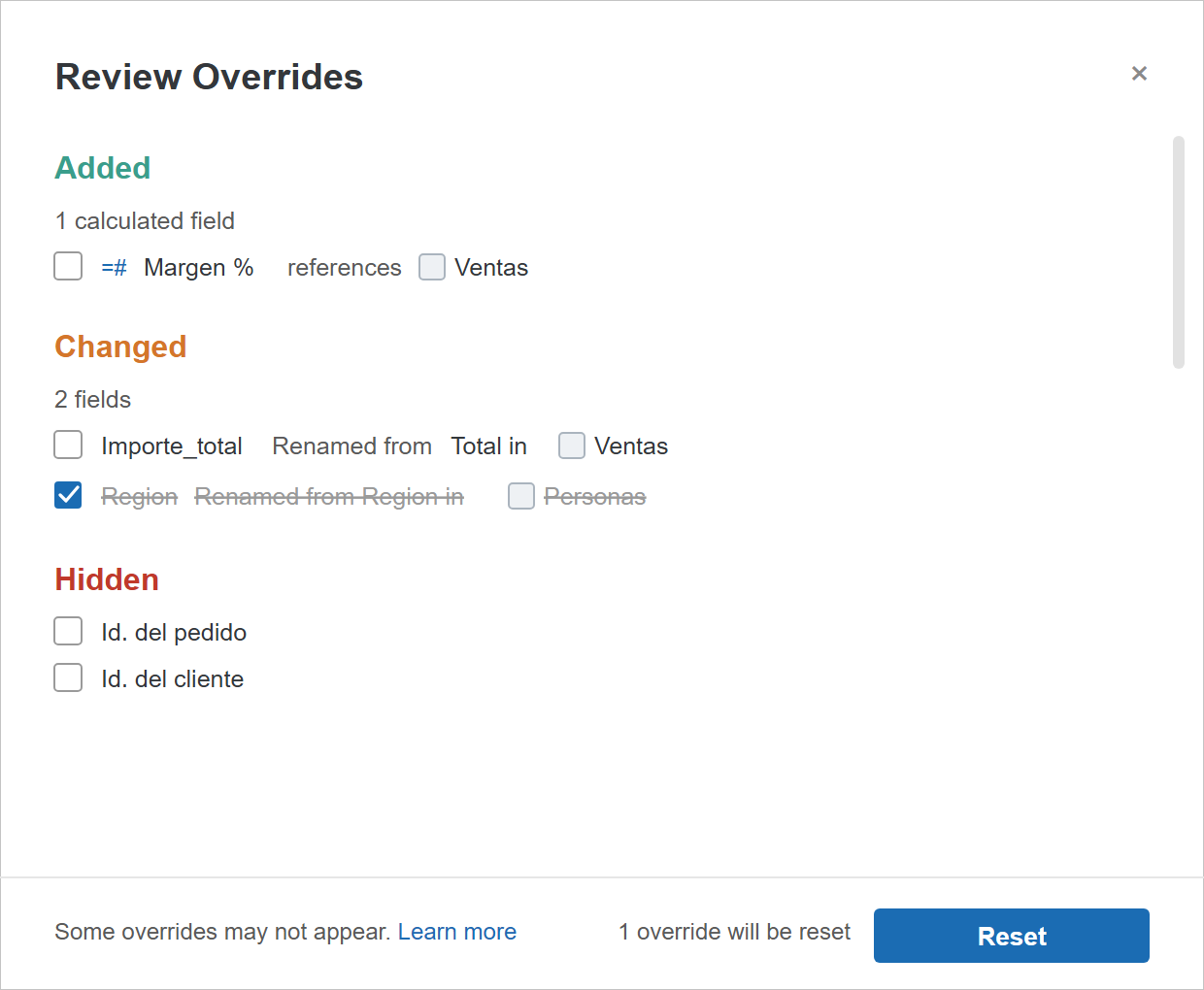 Cuadro de diálogo Review Overrides de Tableau con las secciones Added, Changed y Hidden y el botón Reset